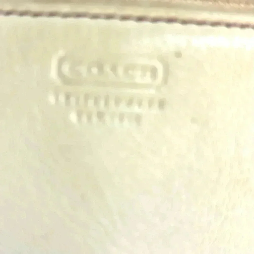 Coach vintage beige leather wristlet wallet